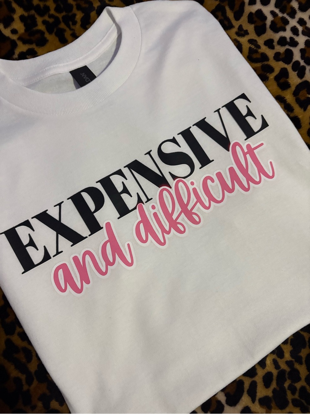 White Kids Crewneck Tee with 'EXPENSIVE and difficult' Graphic
